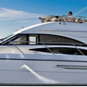 Princess 42 flybridge yacht cruising in the clear blue waters of Mykonos, showcasing sleek exterior lines, spacious flybridge seating, and luxury motor yacht design in the Greek islands.