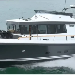 Targa 46 motor yacht cruising near Santorini Caldera during a luxury private half-day ruise