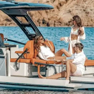 Guests relaxing on a Saxdor 320 luxury yacht during a charter in Paros, Greece