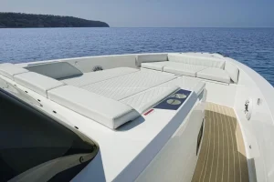 Front view of DE ANTONIO 42 motor yacht sailing in the crystal-clear waters of Paros, Greece