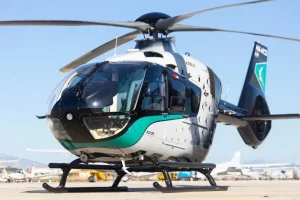 Airbus ACH135 helicopter in Mercedes-AMG Petronas F1 Team special livery landed at a Greek airport for VIP charter service