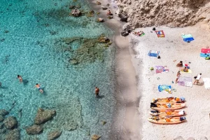 milos_greece_september_10_2015__top_view_of_canoes_at_tsigrado_beach_in_milos_island_cyclades-2